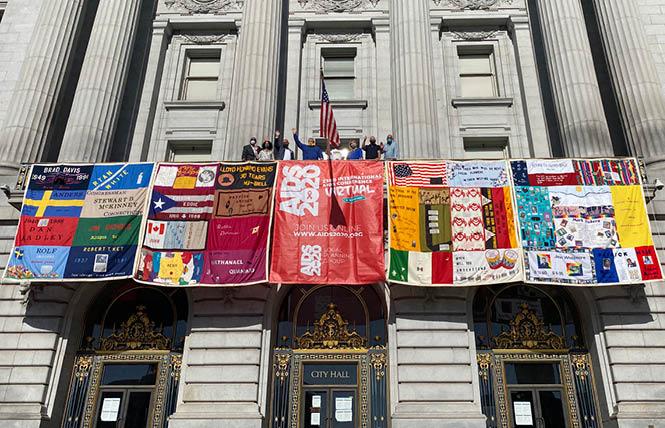 The AIDS Memorial Quilt Panel was announced on Monday, July 6, from San Francisco City Hall, now at the start of the de facto International AIDS Conference.  Photo: Liz Highleyman