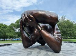 The Embrace sculpture in the Boston Common honoring Dr. Martin Luther King and his wife Coretta Scott King. Photo via Adobe Stock.